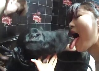 Zoo threesome - Skinny Asian girls are taking a bath with black dog