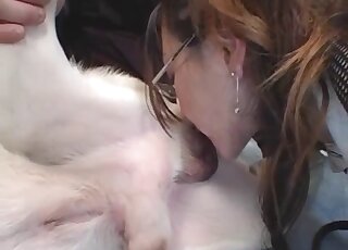 Clothed Japanese ass licks the dog in front of her master