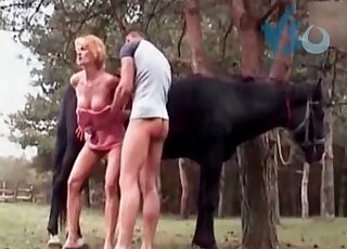 Mature zoophile slut gets a mouthful of cum from a horse and her fuckmate